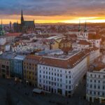 A view of a city at sunset from a high point of view